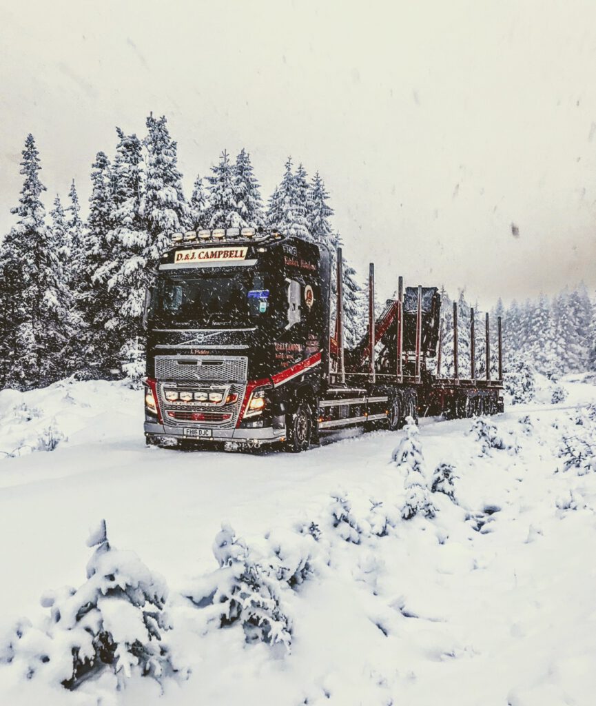 D&J Campbell Volvo FH16 timber lorry in snow